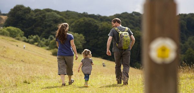 A family walking on Selsey Common on the Cotswold Way. Picture courtesy Cotswolds Conservation Board.